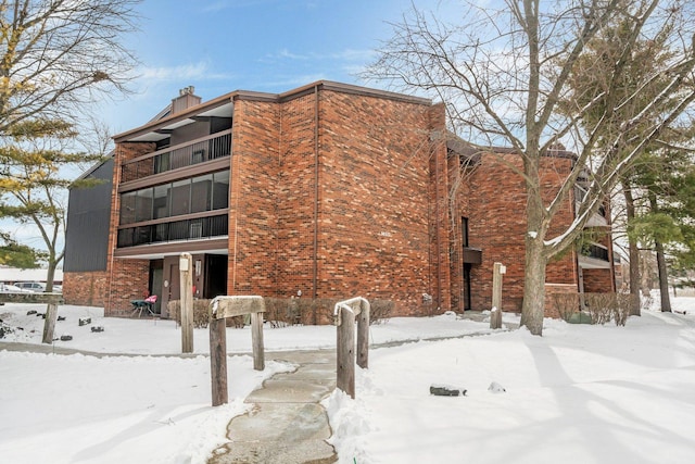 view of snow covered property