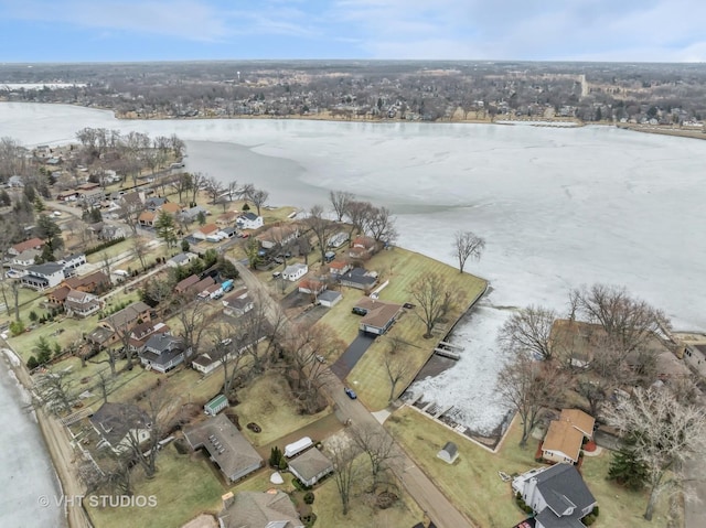 aerial view with a water view and a residential view