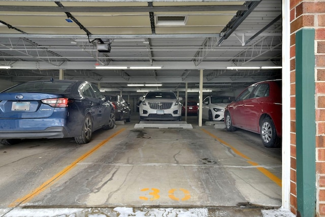 garage featuring a garage door opener