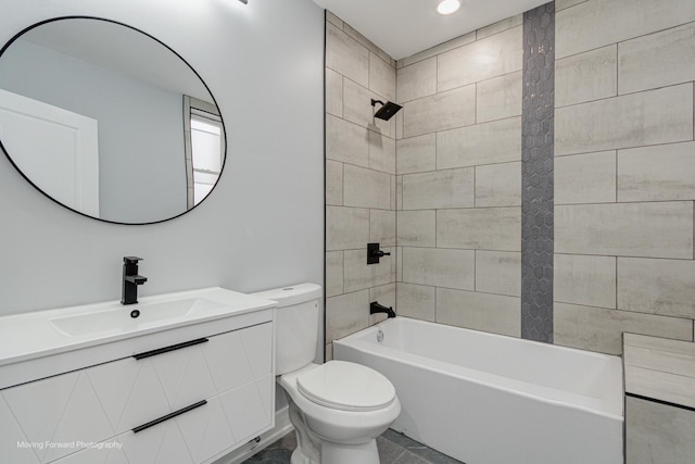 full bathroom featuring vanity, toilet, and tiled shower / bath combo