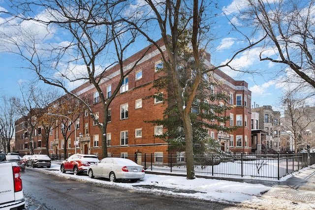 view of snow covered property