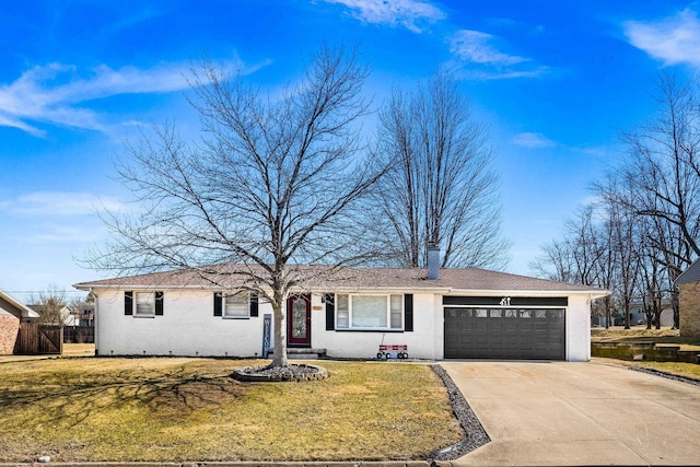 ranch-style home with concrete driveway, a garage, fence, and a front lawn