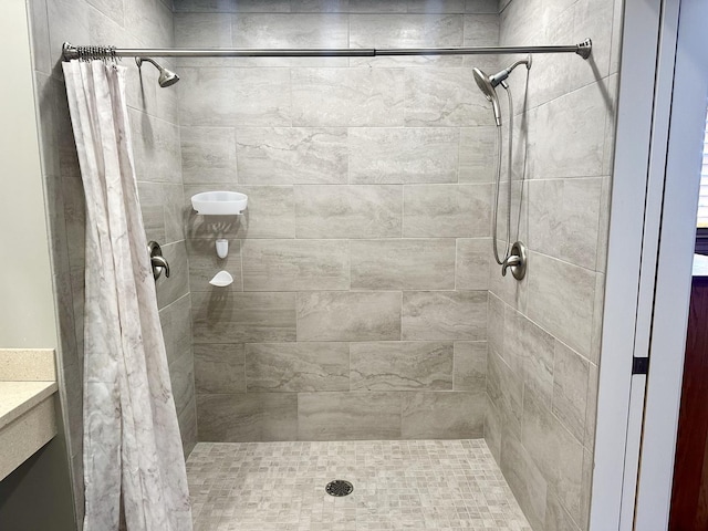 bathroom with vanity and walk in shower