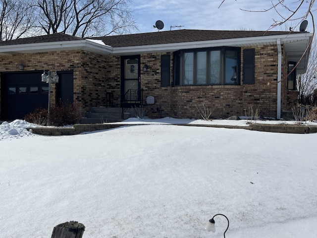 single story home featuring a garage