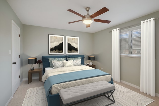 bedroom featuring light carpet and ceiling fan