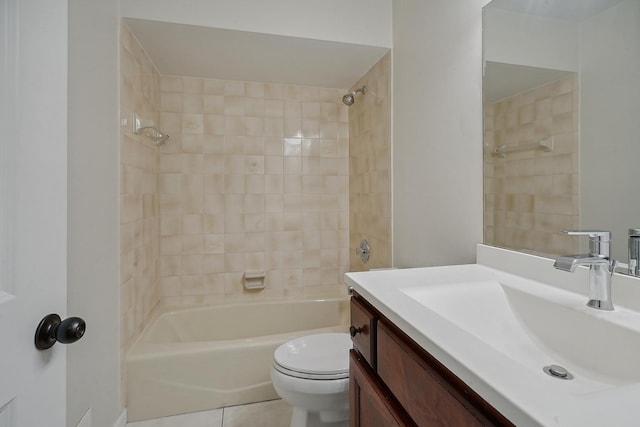 full bathroom featuring tile patterned floors, vanity, toilet, and tiled shower / bath combo