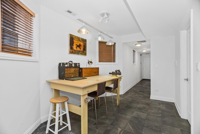 dining area featuring visible vents and baseboards