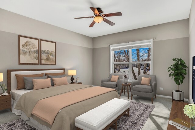 bedroom featuring light carpet, ceiling fan, and baseboards