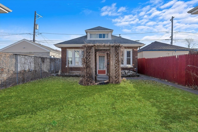 view of front of property with a front lawn