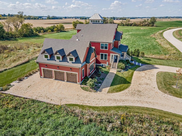 birds eye view of property featuring a rural view