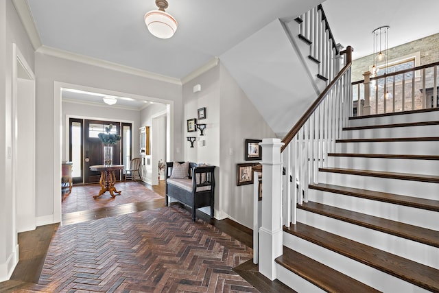 entrance foyer with crown molding