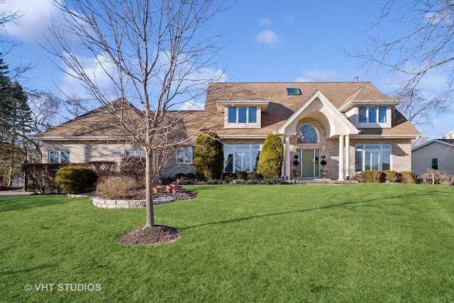 view of front of property with a front lawn