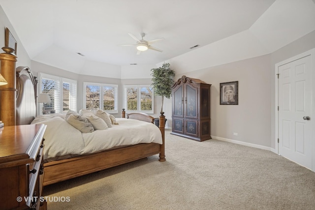 bedroom with multiple windows, baseboards, visible vents, and light carpet