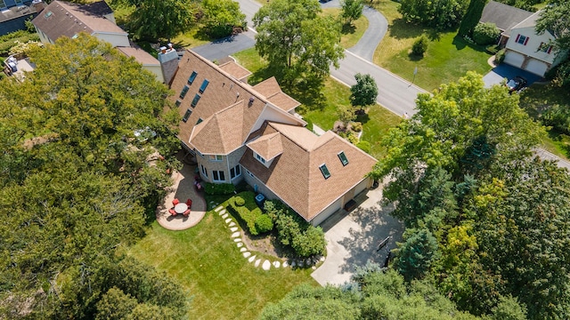 birds eye view of property with a residential view