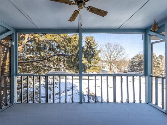 exterior space featuring ceiling fan