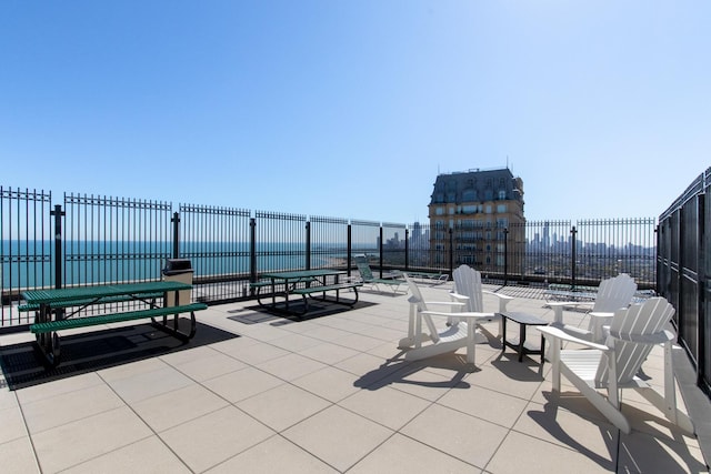 view of patio / terrace featuring a water view