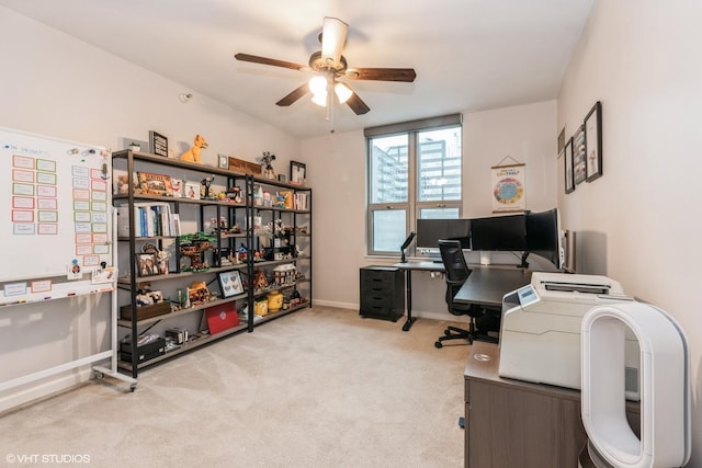 carpeted office with ceiling fan