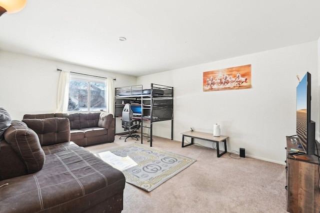 living room featuring carpet floors and baseboards