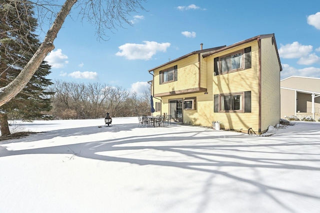 view of snow covered property