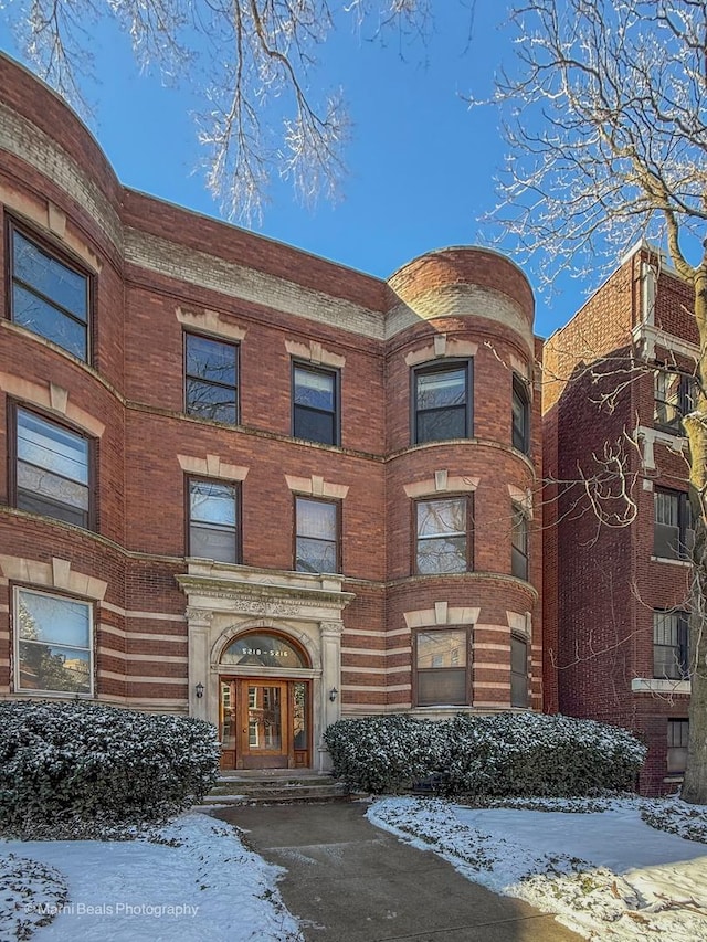 view of snow covered building