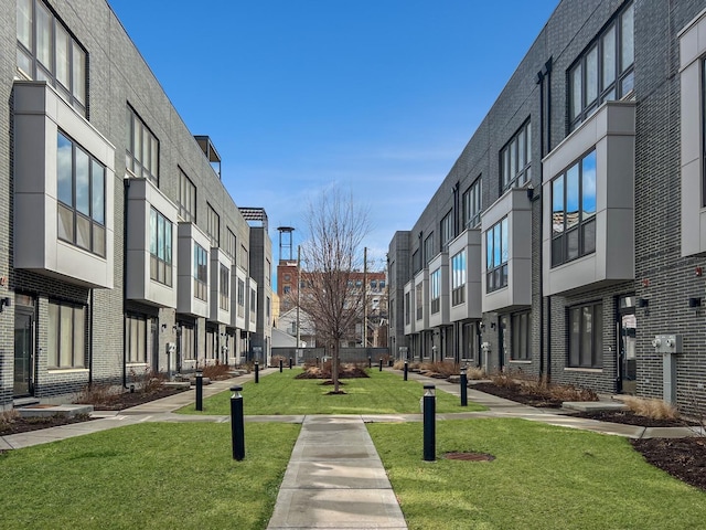 surrounding community featuring a residential view and a lawn