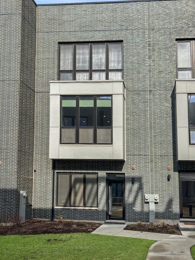 view of front of property with brick siding