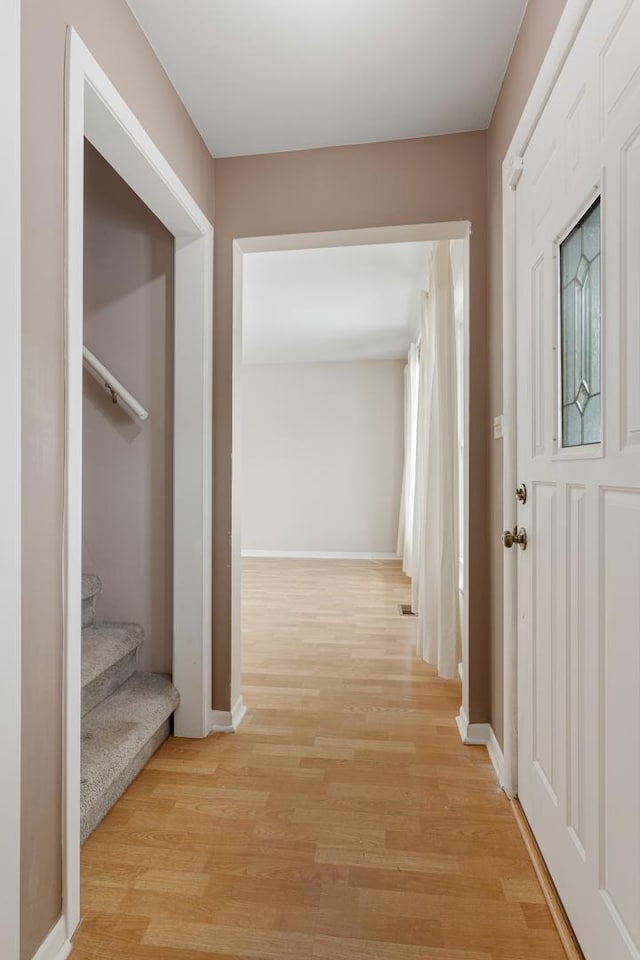 hallway featuring light hardwood / wood-style flooring