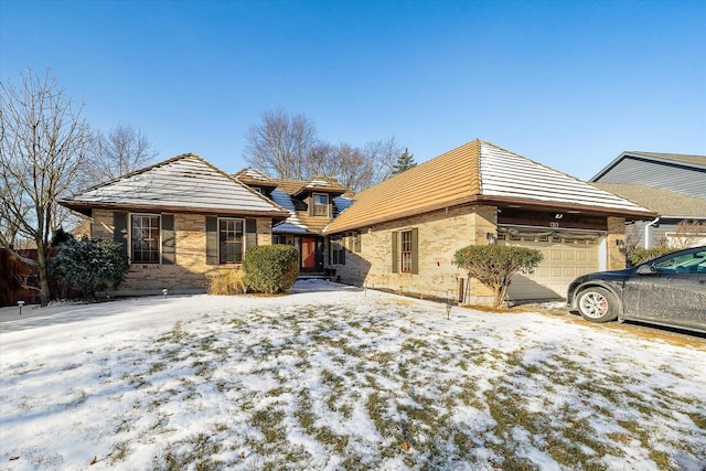 view of front of property featuring a garage