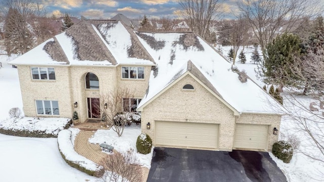 view of front of property with a garage