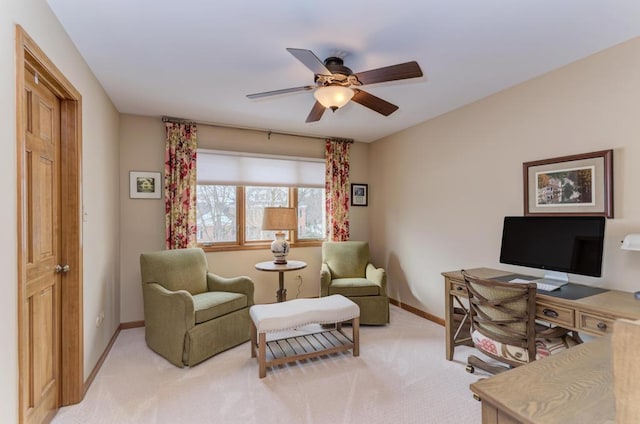 carpeted office with ceiling fan