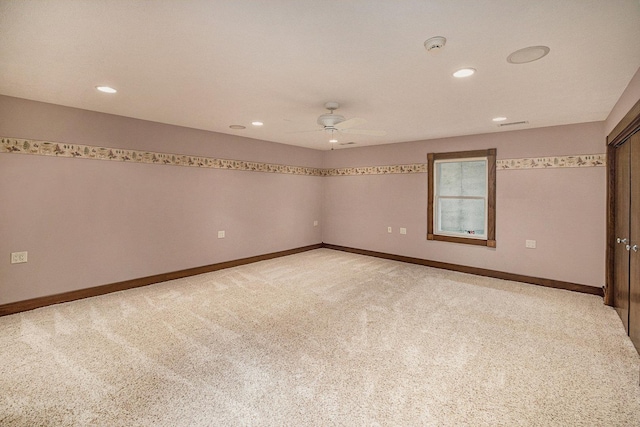 unfurnished room with a ceiling fan, recessed lighting, light carpet, and baseboards