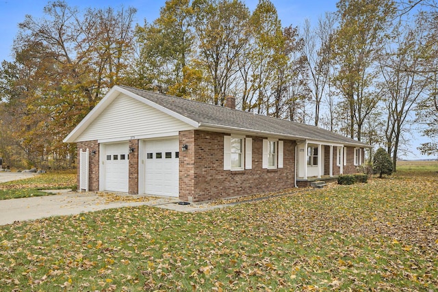 view of front facade featuring an attached garage, brick siding, a shingled roof, a front lawn, and a chimney