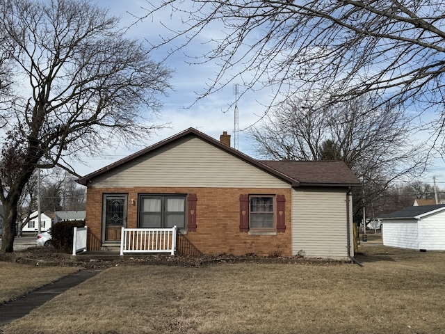 exterior space with a front lawn