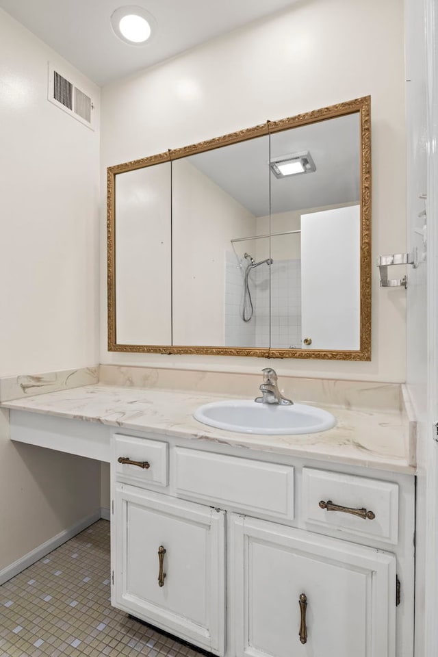 full bath featuring tile patterned floors, visible vents, a shower, and vanity