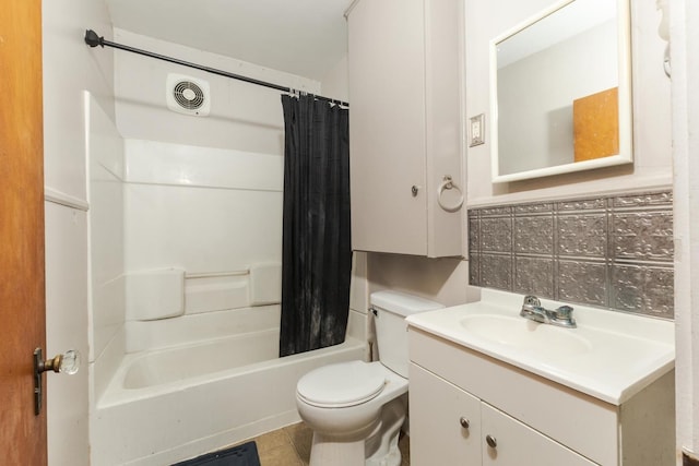 full bathroom featuring vanity, toilet, tile patterned flooring, and shower / tub combo