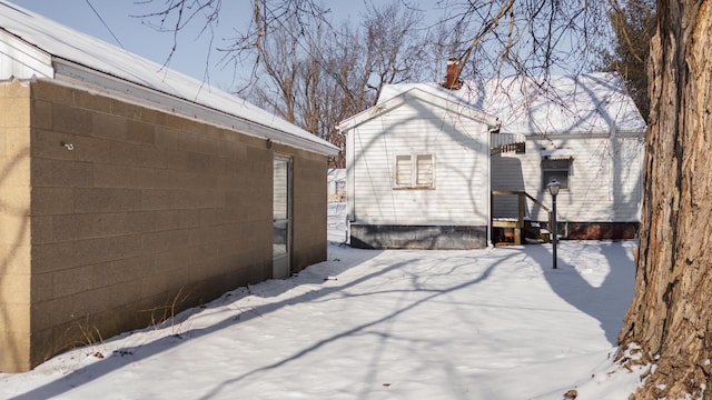 view of snow covered property