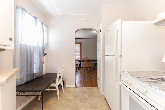 kitchen with white gas range oven