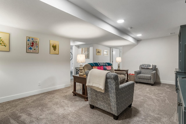 living room featuring carpet, baseboards, and recessed lighting