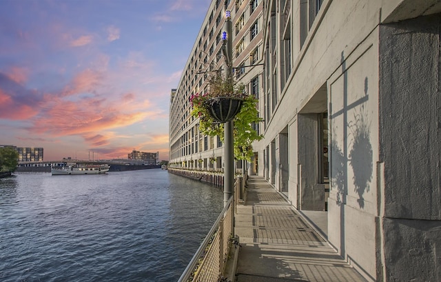 dock area featuring a water view