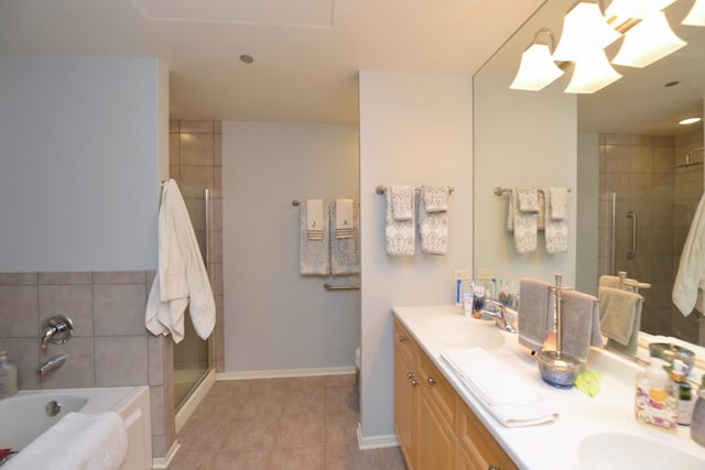 bathroom with separate shower and tub, vanity, and tile patterned flooring