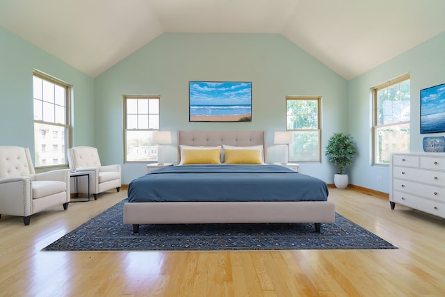 bedroom with multiple windows, vaulted ceiling, light wood-style flooring, and baseboards