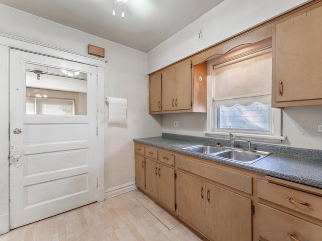 kitchen featuring sink and light hardwood / wood-style floors