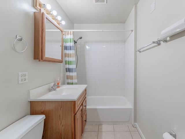 full bathroom with tile patterned flooring, shower / bath combo, vanity, and toilet