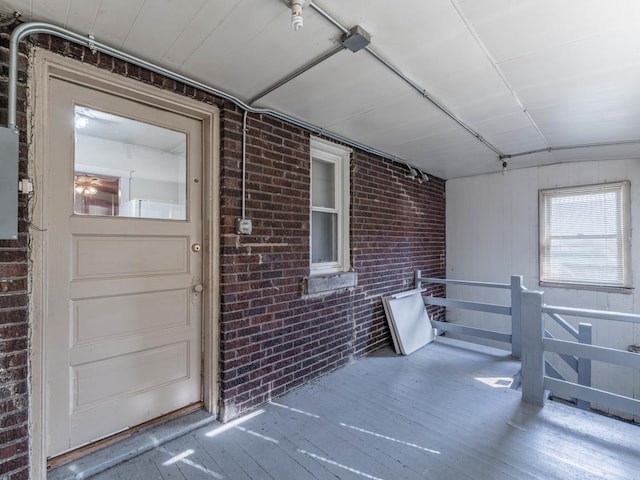 view of exterior entry with a porch