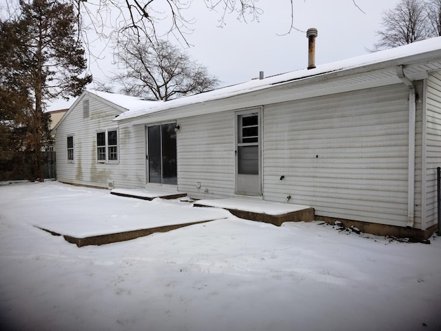 view of snow covered property