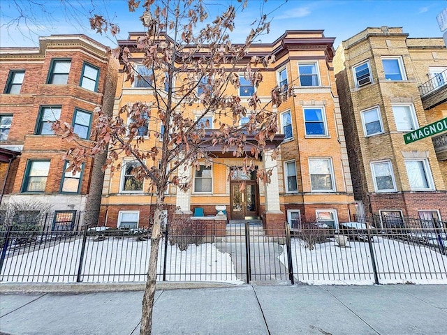 view of property featuring fence