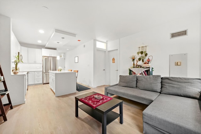 living room with light wood-type flooring