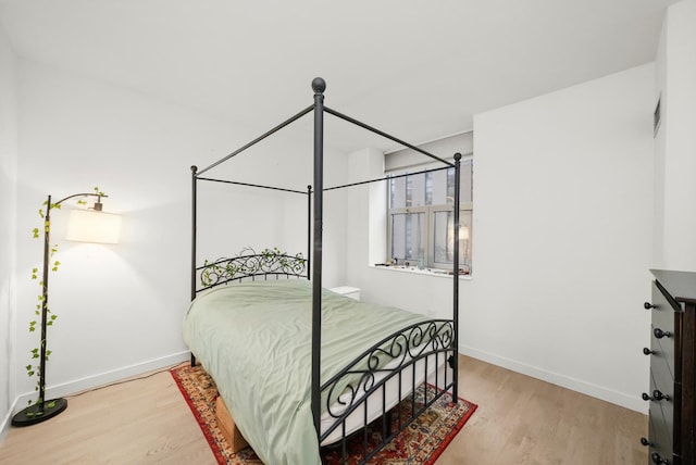 bedroom featuring light hardwood / wood-style flooring