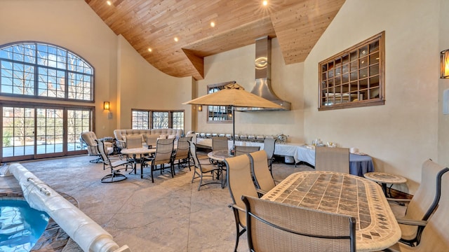 dining area featuring recessed lighting, high vaulted ceiling, and wooden ceiling