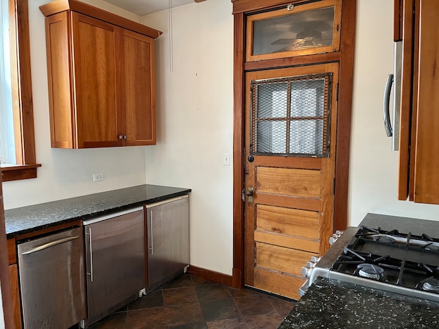 kitchen with refrigerator and gas stove